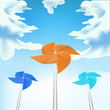 Windmills on sky background, vector