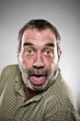 Mature Caucasian Man Sticking Out Tongue Portrait