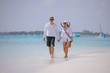 happy young couple have fun on beach