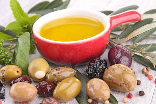 Photo: cooking oil and olive cooking oil and olive