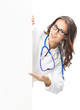 Doctor showing blank signboard, isolated