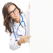 Doctor showing blank signboard, isolated