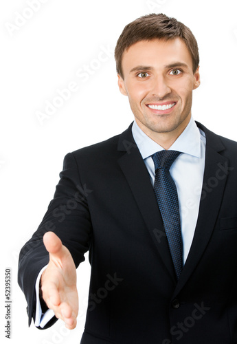 Photo: Businessman giving hand for handshake, isolated Businessman giving hand for handshake, isolated