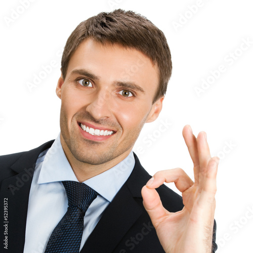 Photo: Businessman with okay gesture, isolated Businessman with okay gesture, isolated