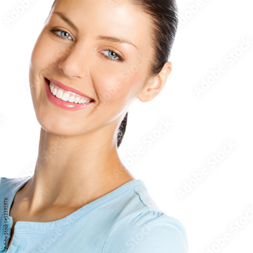 Photo: Happy smiling young woman, over white Happy smiling young woman, over white