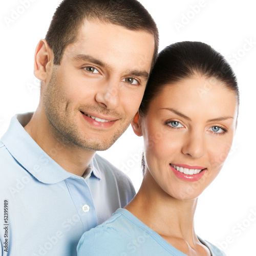 Photo: Portrait of young couple, isolated Portrait of young couple, isolated