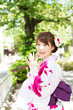 Beautiful young woman wearing japanese traditional kimono