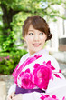 Beautiful young woman wearing japanese traditional kimono