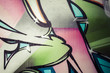Colorful graffiti, abstract grunge grafiti background over textu
