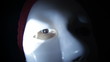 Scary horror masked man in darkness