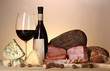 Exquisite still life of wine, cheese and meat products