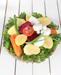 Many peeled vegetables  on wooden background