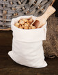 Beans in sack on wooden background