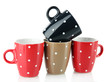 Four cups of polka dot isolated on white