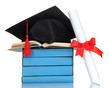 Grad hat with diploma and books isolated on white