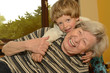 Photo: Grandma & Kid Playing at Home 1 Grandma & Kid Playing at Home 1