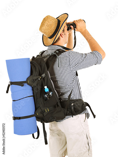 Photo: Young hiker man tourist with binocular, isolated on white Young hiker man tourist with binocular, isolated on white