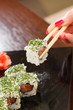 sushi with chopsticks