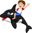 Boy riding orca