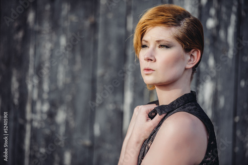 Photo: fashion model posing outdoor in a rural setting fashion model posing outdoor in a rural setting
