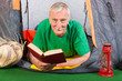 Photo: Senior man at the camping Senior man at the camping
