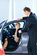 Woman buying a new car