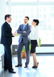 Photo: Businesspeople Having Meeting In Modern Office Businesspeople Having Meeting In Modern Office