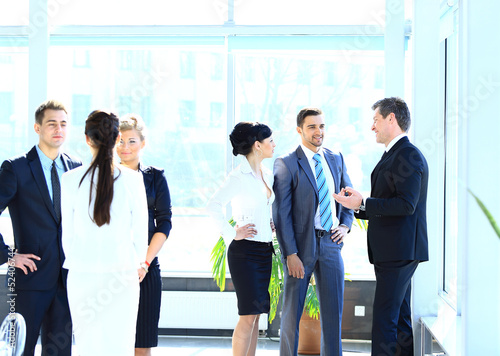 Photo: Businesspeople Having Meeting In Modern Office Businesspeople Having Meeting In Modern Office