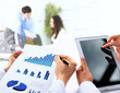 Photo: busienssman holding digital tablet in office busienssman holding digital tablet in office