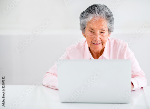 Photo: Elder woman using a laptop Elder woman using a laptop