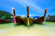 Foto: Thai traditional boats in the bay. Thailand, Phi Phi Island Thai traditional boats in the bay. Thailand, Phi Phi Island