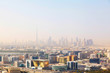 Dubai's skyscrapers and top view on a sunny day
