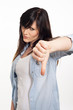 portrait of a beautiful young woman thumbs down