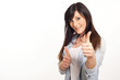 portrait of a beautiful young woman thumbs up