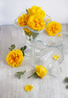 goblets and bunch of flowers - yellow roses