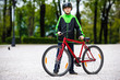 Urban biking - teenage boy and bike in city