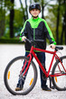 Urban biking - teenage boy and bike in city