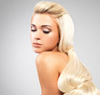 Blond woman with long straight hairs