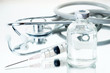 Medical ampoules, syringe and stethoscope