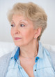 Portrait of an attractive elegant senior woman relaxingand dream