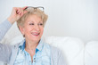 Senior woman portrait, at home with white hair
