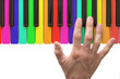 Rainbow piano keyboard with hand