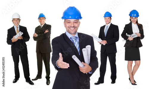 Photo: Portrait of happy architect and his team Portrait of happy architect and his team