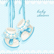 Baby shower card with blue booties and lace