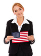 Photo: Geschäftsfrau hält Flagge der USA Geschäftsfrau hält Flagge der USA