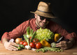 young farmer with vegetables