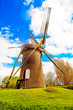 Traditional Old dutch windmill in Holland with blue sky