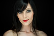 Portrait of a bautiful young woman with red lipstick