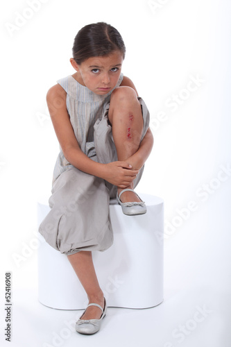 Photo: portrait of little girl with injury portrait of little girl with injury