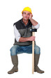 Photo: Construction worker with a sledgehammer Construction worker with a sledgehammer
